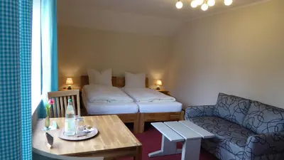 Ein Bett oder Betten in einem Zimmer der Unterkunft Haus Rosmarin