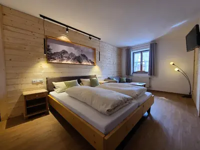 Ein Bett oder Betten in einem Zimmer der Unterkunft Landgasthof Wangerstuben