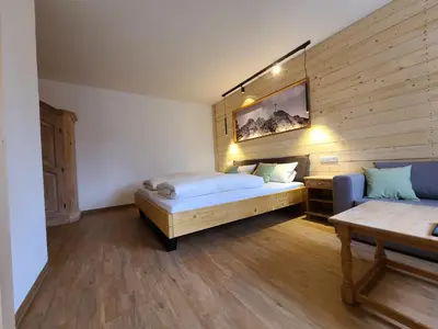 Ein Bett oder Betten in einem Zimmer der Unterkunft Landgasthof Wangerstuben