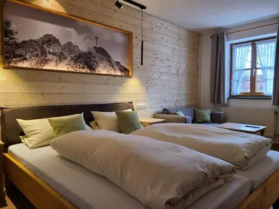 Ein Bett oder Betten in einem Zimmer der Unterkunft Landgasthof Wangerstuben