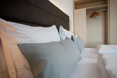 Ein Bett oder Betten in einem Zimmer der Unterkunft Hotel am Campus
