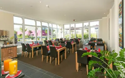 Ein Restaurant oder anderes Speiselokal in der Unterkunft Come IN Comfort