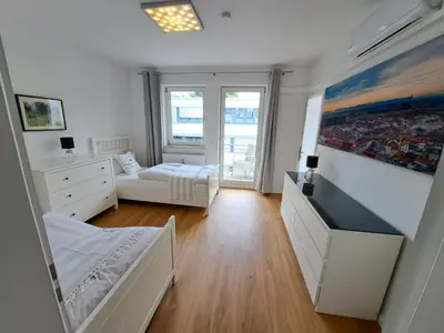 Ein Bett oder Betten in einem Zimmer der Unterkunft East Park Apartments Baumkirchner Str 18