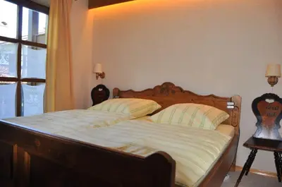 Ein Bett oder Betten in einem Zimmer der Unterkunft Ferienwohnung Andrea
