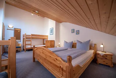 Ein Bett oder Betten in einem Zimmer der Unterkunft Utznhof