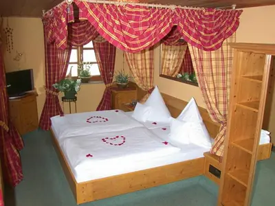 Ein Bett oder Betten in einem Zimmer der Unterkunft Hotel 