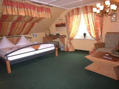 Ein Bett oder Betten in einem Zimmer der Unterkunft Hotel 