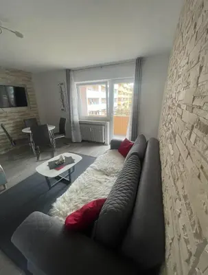 Ein Sitzbereich in der Unterkunft Modern Apartment