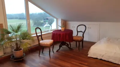 Ein Bett oder Betten in einem Zimmer der Unterkunft helles Dachstudio