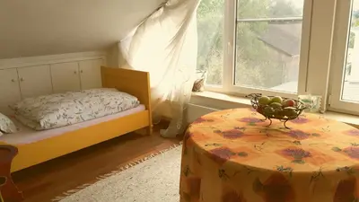 Ein Bett oder Betten in einem Zimmer der Unterkunft helles Dachstudio
