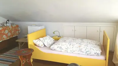 Ein Bett oder Betten in einem Zimmer der Unterkunft helles Dachstudio