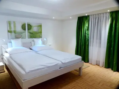 Ein Bett oder Betten in einem Zimmer der Unterkunft Wolke7