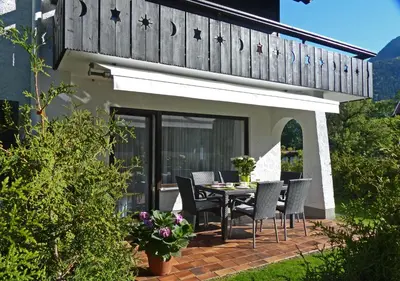 Ein Garten an der Unterkunft Wolke7