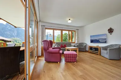 Ein Sitzbereich in der Unterkunft Ferienhaus Alpinissimo