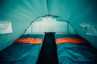 Ein Bett oder Betten in einem Zimmer der Unterkunft ESN Oktoberfest Campsite