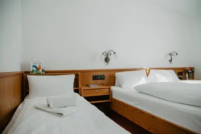 Ein Bett oder Betten in einem Zimmer der Unterkunft Weßner Hof Landhotel & Restaurant