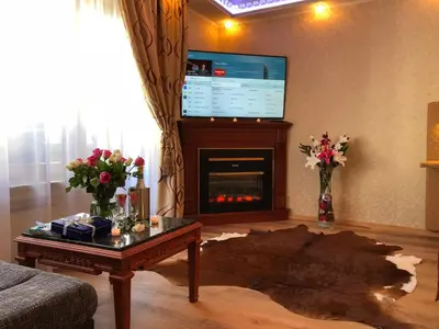 TV/Unterhaltungsangebot in der Unterkunft Golden GaPa Studio Apartment 20