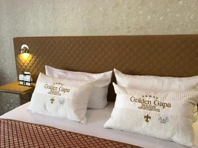 Ein Bett oder Betten in einem Zimmer der Unterkunft Golden GaPa Studio Apartment 20