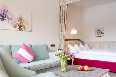 Ein Bett oder Betten in einem Zimmer der Unterkunft Adolphine Garden