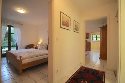 Ein Bett oder Betten in einem Zimmer der Unterkunft FeWo Gudrun