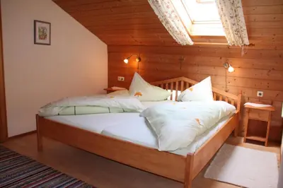 Ein Bett oder Betten in einem Zimmer der Unterkunft Jaklhof