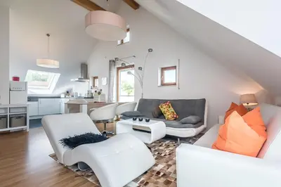 Ein Sitzbereich in der Unterkunft Apartmenthaus am Erlbach