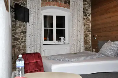 Ein Bett oder Betten in einem Zimmer der Unterkunft Pension Hirsch