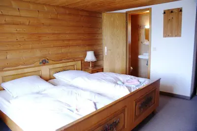 Ein Bett oder Betten in einem Zimmer der Unterkunft Pension Hirsch
