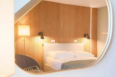 Ein Bett oder Betten in einem Zimmer der Unterkunft Hotel Klostergasthof