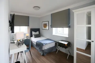 Ein Bett oder Betten in einem Zimmer der Unterkunft Hotel zur Schloss-Schmiede
