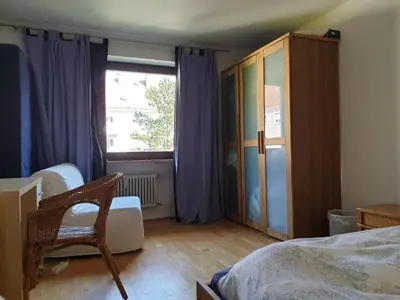 Ein Bett oder Betten in einem Zimmer der Unterkunft Oktoberfest
