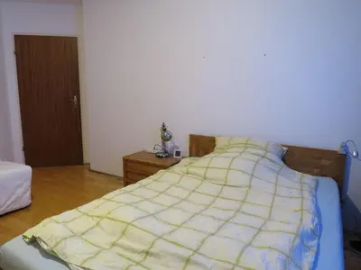 Ein Bett oder Betten in einem Zimmer der Unterkunft Oktoberfest