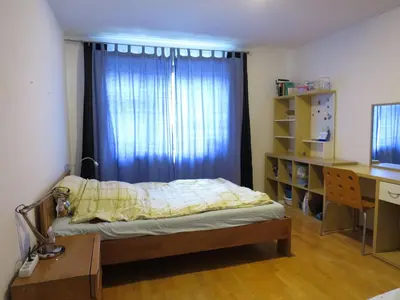 Ein Bett oder Betten in einem Zimmer der Unterkunft Oktoberfest