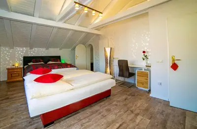 Ein Bett oder Betten in einem Zimmer der Unterkunft Hotel Brandl