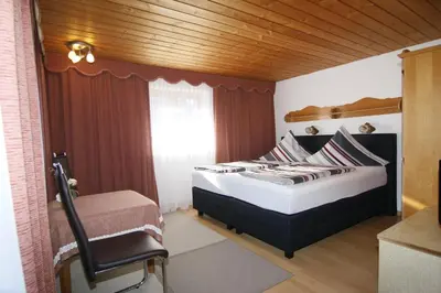 Ein Bett oder Betten in einem Zimmer der Unterkunft Gästehaus Kirner - Bad Feilnbach
