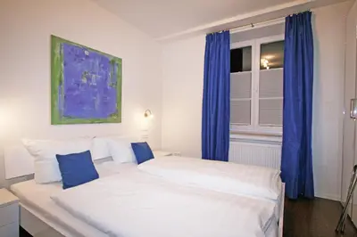 Ein Bett oder Betten in einem Zimmer der Unterkunft Ferienwohnung Am Kurpark -Wohnung 2,90qm-