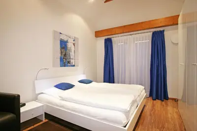 Ein Bett oder Betten in einem Zimmer der Unterkunft Ferienwohnung Am Kurpark -Wohnung 3,150qm- mit Lift