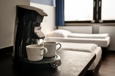 Ein Bett oder Betten in einem Zimmer der Unterkunft apartmenthaus international