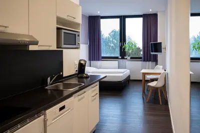 Küche/Küchenzeile in der Unterkunft apartmenthaus international
