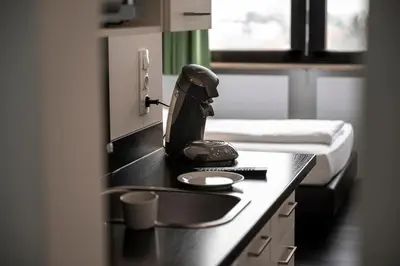 Küche/Küchenzeile in der Unterkunft apartmenthaus international