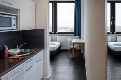 Ein Bett oder Betten in einem Zimmer der Unterkunft apartmenthaus international