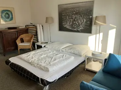 Ein Bett oder Betten in einem Zimmer der Unterkunft An den Isarauen