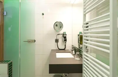 Ein Badezimmer in der Unterkunft Hotel Holl