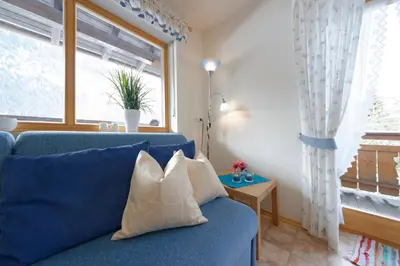 Ein Sitzbereich in der Unterkunft Haus-Schneider-Sepp