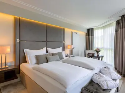 Ein Bett oder Betten in einem Zimmer der Unterkunft Pullman Munich