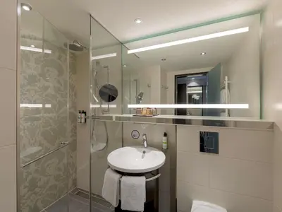Ein Badezimmer in der Unterkunft Pullman Munich