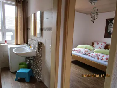 Ein Bett oder Betten in einem Zimmer der Unterkunft Ferienwohnung Rosa