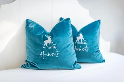 Ein Bett oder Betten in einem Zimmer der Unterkunft Der Hochsitz