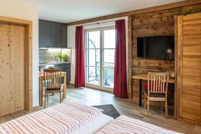 Ein Bett oder Betten in einem Zimmer der Unterkunft Pension und Appartements Wild