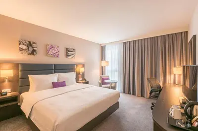 Ein Bett oder Betten in einem Zimmer der Unterkunft Hilton Garden Inn Munich City West